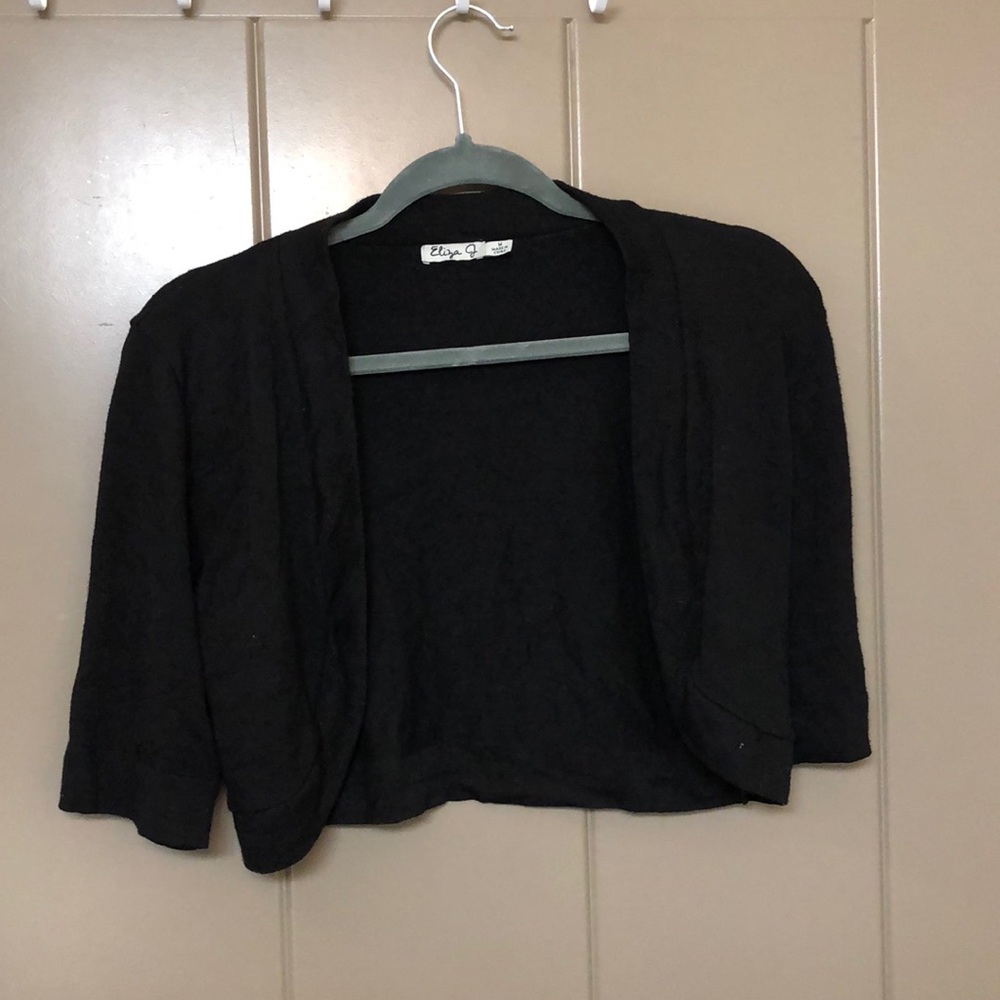 Black shrug